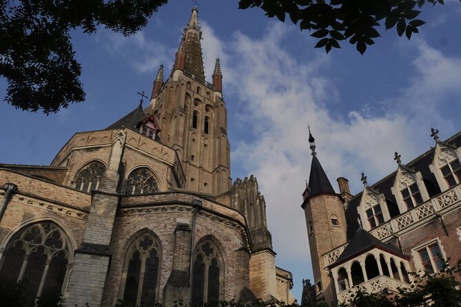 Across Bruges History Equals Fun with chocolate and waffle sample - What the guide adds to the walk