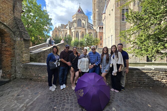 Authentic and Complete Bruges, with Local Guide and Chocolate - Minnewater Lake, swans, and the decline of Bruges