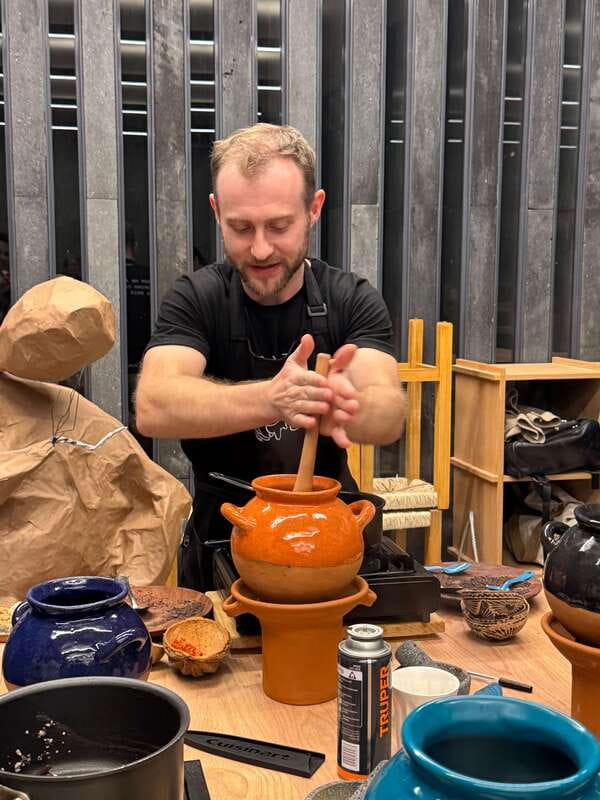 Bean to Beverage: Roast and grind cacao into chocolate - Grinding on a metate, where the work gets real