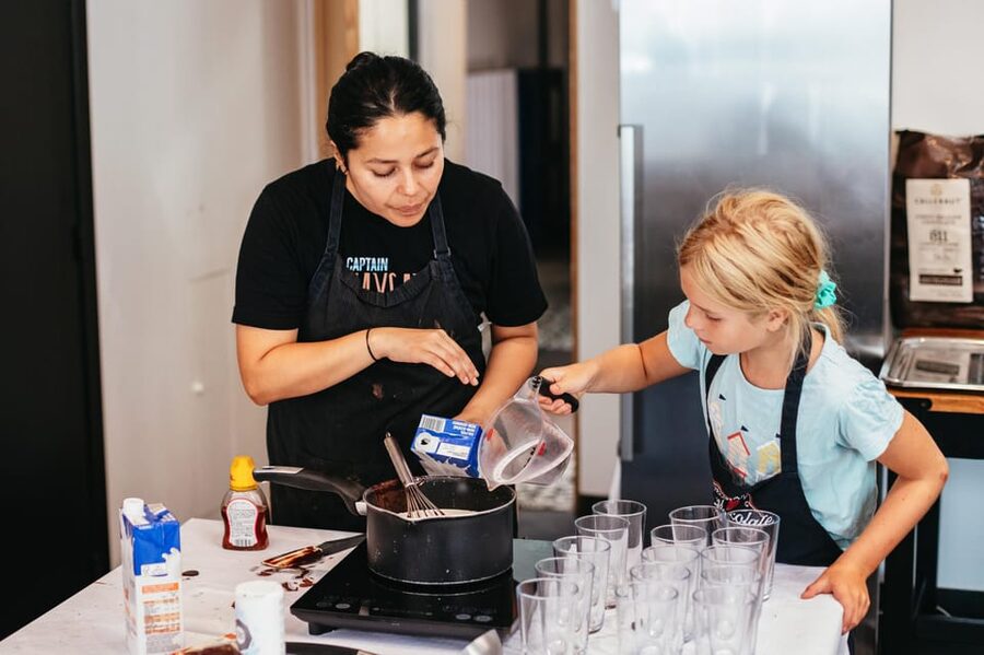 Bruges: Belgian Praline and Mendiants Chocolate Workshop - Decorating mendiants with fruit and texture