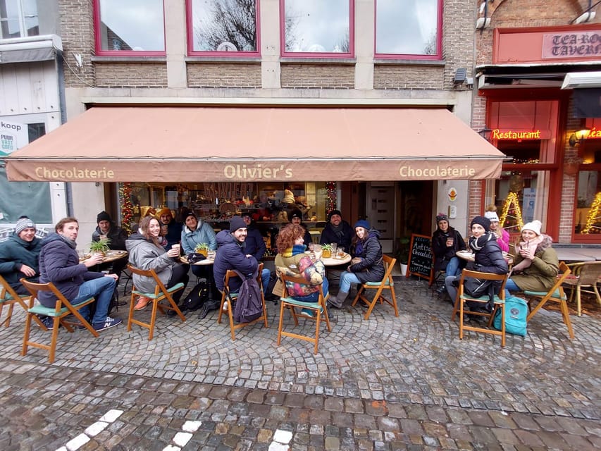 Bruges: Walking Tour with Hot Chocolate & Chocolate Tasting - Markt and Burg Square: Bruges in two quick chapters