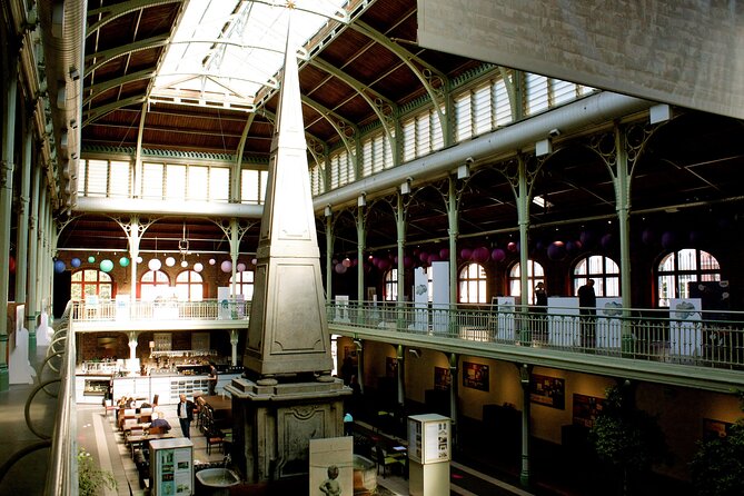 Brussels Beer and Chocolate Walking Tour - Walking past Brussels landmarks