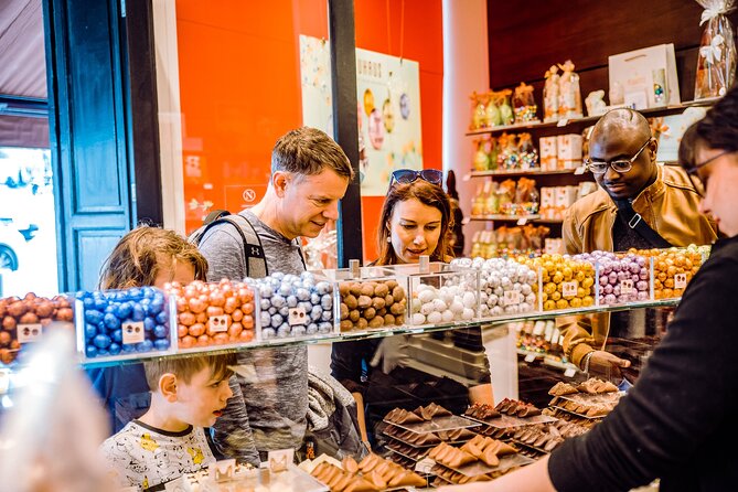 Brussels Chocolate Tour Private & Personalized with a Local Guide - A charming square with chocolate shops on every side