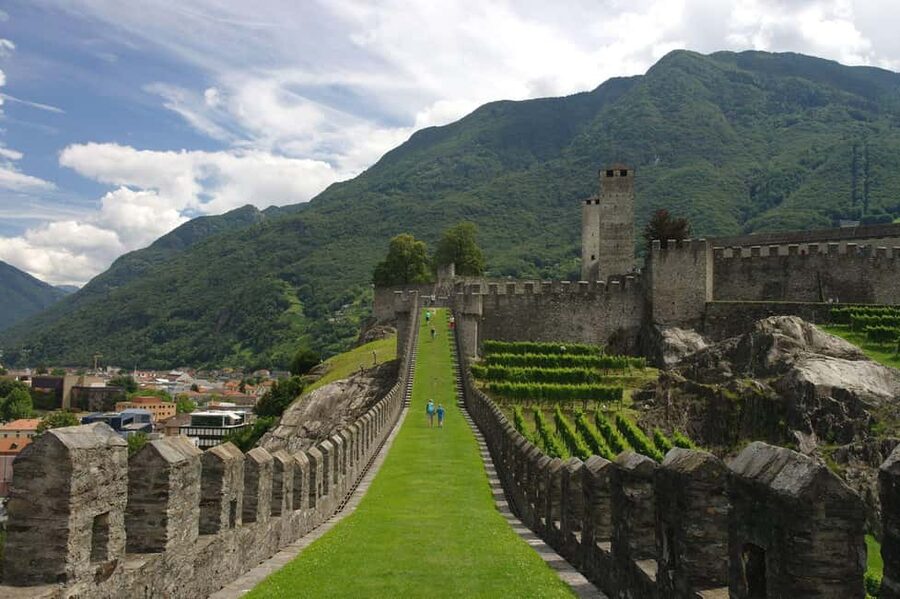 From Milan: Lugano, Bellinzona and Chocolate Factory Trip - Transport, pace, and physical demands
