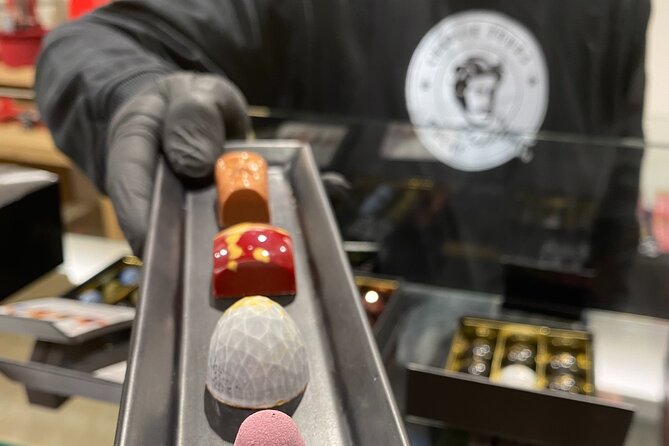 Ghent: Famous Belgian Chocolate Walking Tour with Tastings - Passion-fruit chocolates at Van Hoorebeke