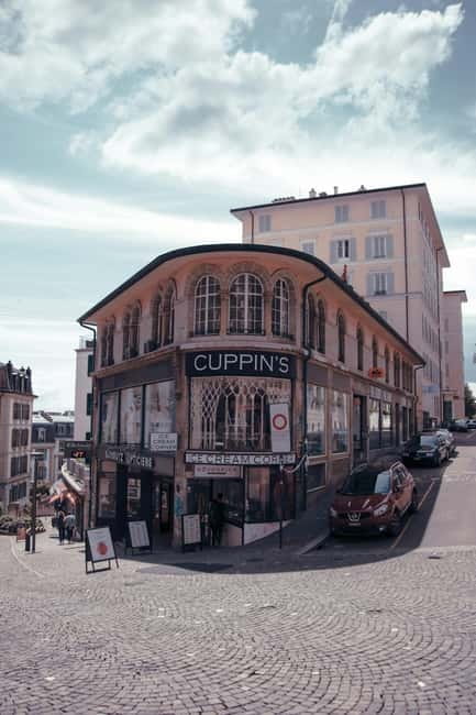 Lausanne: Walking Tour with Chocolate Tastings & Metro - Palais de Rumine and the high town