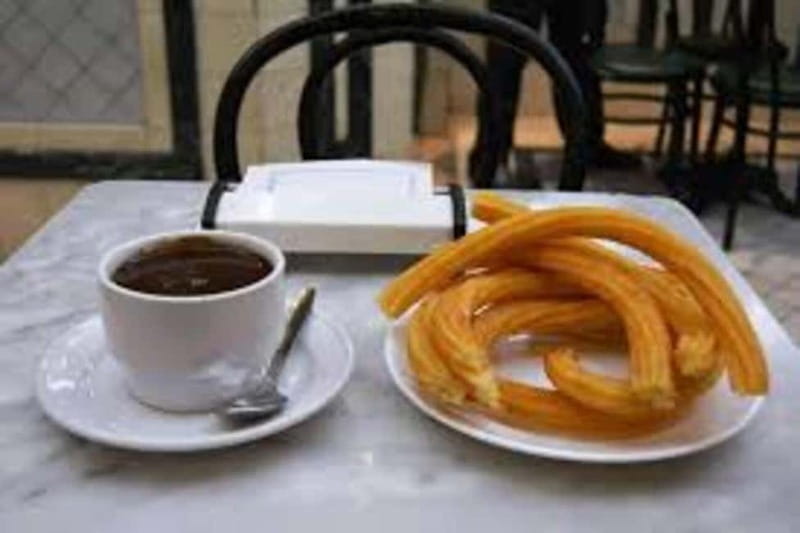 Madrid: Guided Walking Tour with Churros and Hot Chocolate - Almudena Cathedral and the Calle Factor view