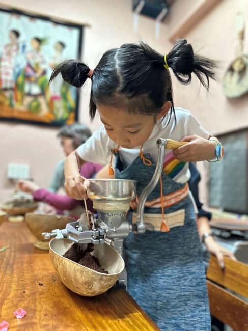 Oaxaca: The Cocoa Experience, from the Grain to Your Cup - Roasting cocoa on a clay comal