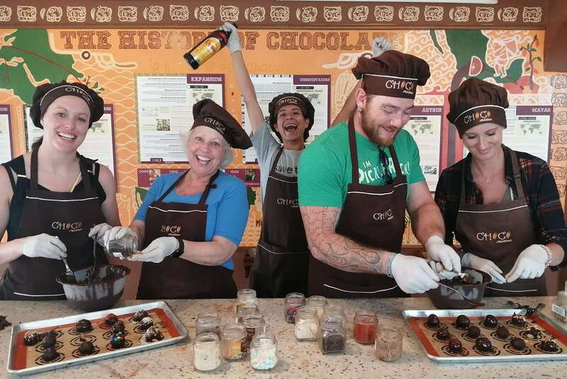 Puerto Vallarta: 2-Hour Chocolate Truffles Workshop - Tempering chocolate on a marble surface