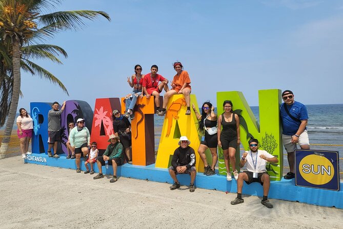 Roatan Sloths & Monkeys, Chocolate Factory plus Beach Break - Rum cake and views at Roatan Rum Company