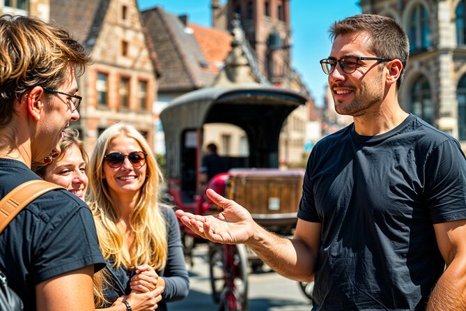 Secrets of Bruges: Walking Tour With a Chocolate and Waffle Bite - Markt, the Historium, and architecture with a past