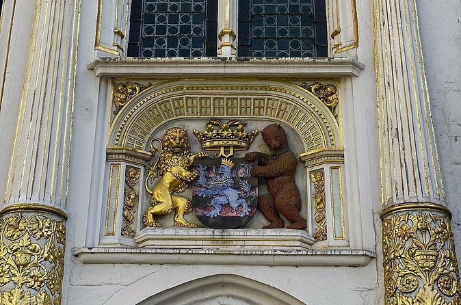 Secrets of Bruges: Walking Tour With a Chocolate and Waffle Bite - From the most horrible square to the prettiest canals