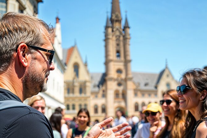 Secrets of Bruges: Walking Tour With a Chocolate and Waffle Bite - The Holy Blood and Bruges’ civic power