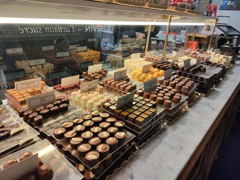 Thé best chocolate in Bruges! Private tour! - Fish Market, Huidenvettersplein, and the canal views