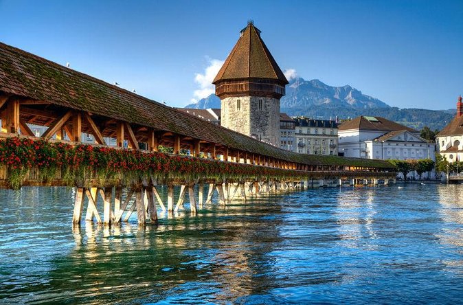 Tony<code>s private city tour with picnic & chocolate degustation – Key points to know before booking’ /></p>
<ul>
<li><strong>Private attention:</strong> Only your group participates, so the guide can adjust the pace and make time for photos.</li>
<li><strong>Three classic Lucerne sights:</strong> The route includes Chapel Bridge, the Old Town, and the Lion Monument.</li>
<li><strong>Food is part of the tour:</strong> Expect a guide-prepared picnic and a chocolate degustation.</li>
<li><strong>Hotel pickup is available:</strong> Share your hotel details when booking so the tour can begin there.</li>
<li><strong>Guides may add personal touches:</strong> Anthony arranged birthday Prosecco for one couple, while Roberto has included quieter neighborhoods and a local chocolatier.</li>
<li><strong>Weather matters:</strong> Poor weather can lead to a new date or a full refund, and rain may make the picnic less comfortable.</li>
</ul>
<h2>A gentle introduction to Lucerne at 3 pm</h2>
<p><img width="669" height="446" decoding="async" src=
