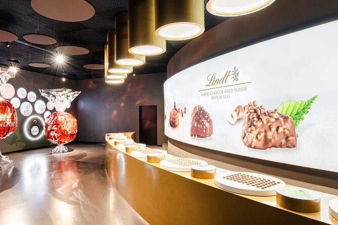 Tour in Lindt Home of Chocolate Museum From Zurich - Watching chocolate production through panoramic windows